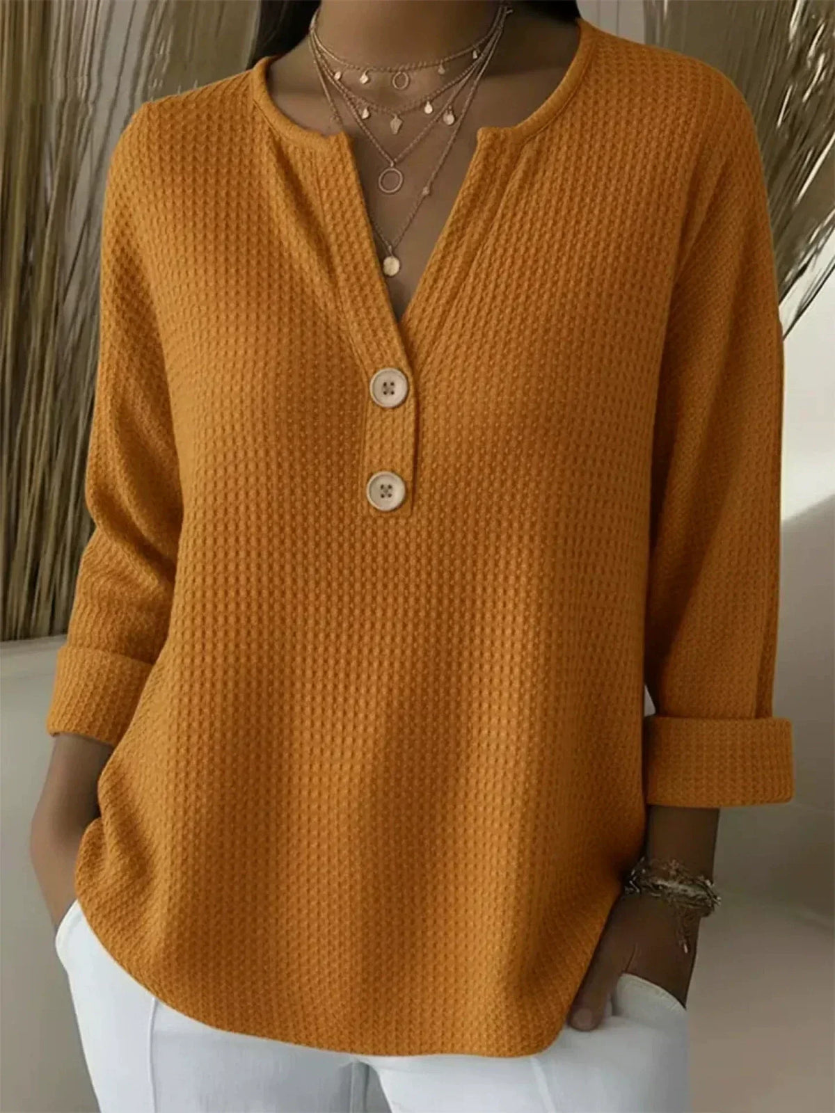 Lucía | T-shirt Henley con texture a nido d'ape e bottoni
